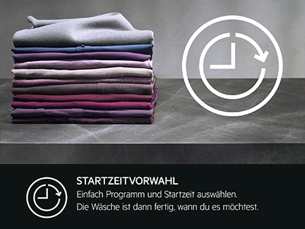 Gestapelte Wäsche mit Symbol für programmierbare Startzeit.